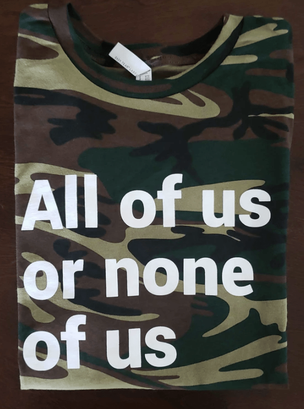 All Of Us Or None Of Us (Camo) T-Shirt | The Inclusion Solution